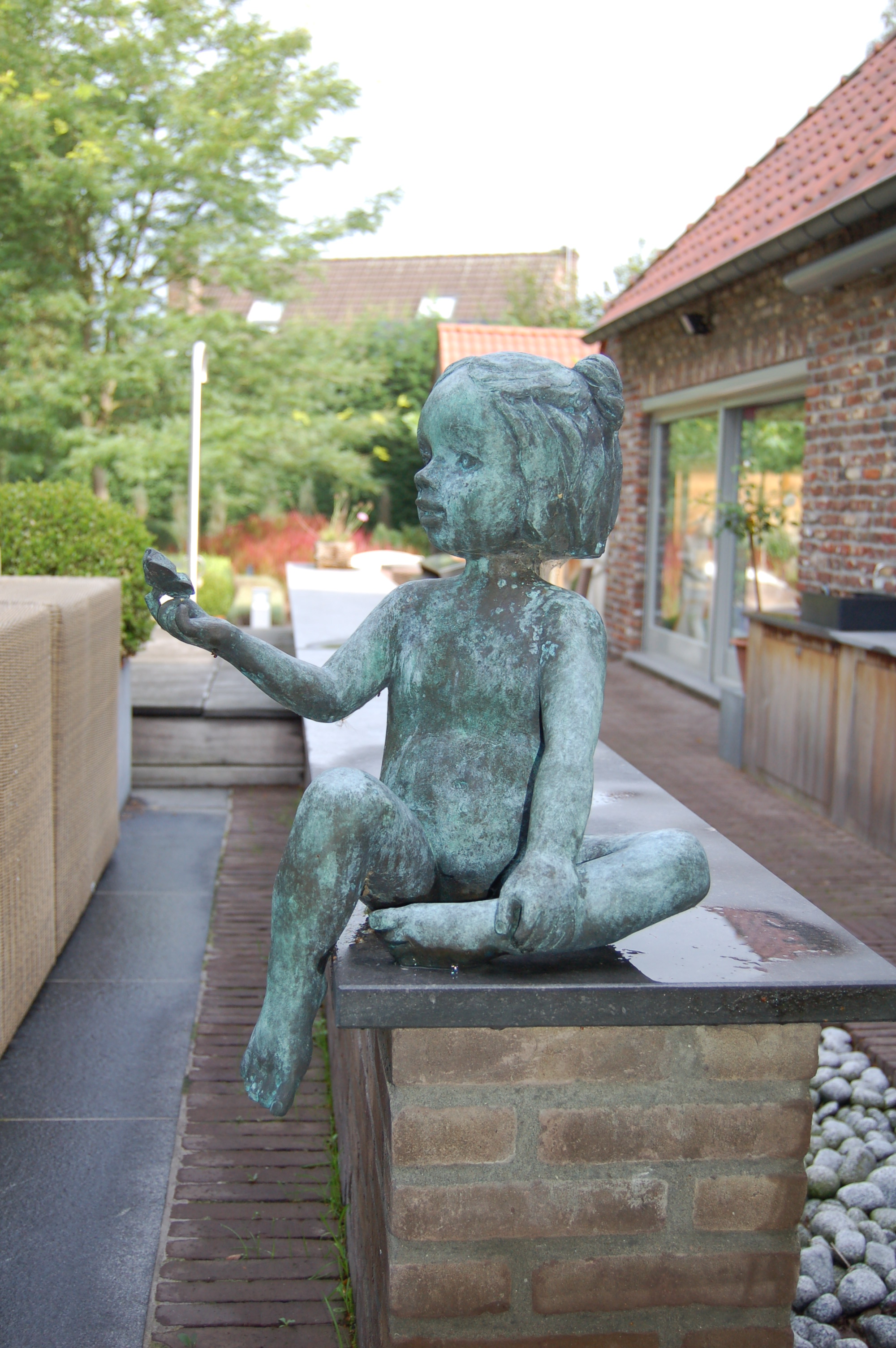 Beeld op tuinmuur Beeld op tuinmuur